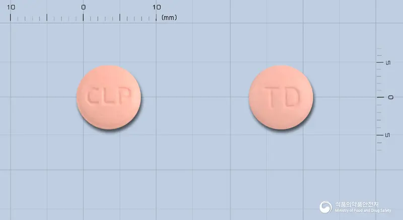 크로피도정(황산수소클로피도그렐) 앞뒤 사진 (분홍색 원형, 각인 CLP / TD)