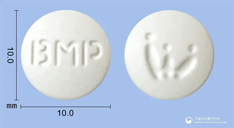 바미필정(바미필린염산염) 앞뒤 사진 (흰색 원형, 각인 BMP)
