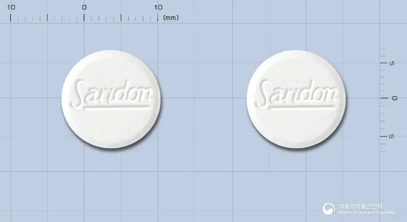 사리돈에이정 앞뒤 사진 (흰색 원형, 각인 Saridon / Saridon)