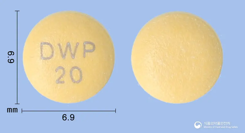 파리벤정20mg(라베프라졸나트륨) 앞뒤 사진 (주황색 원형, 각인 DWP20)