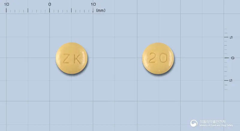 피피라졸정20밀리그램(라베프라졸나트륨) 앞뒤 사진 (노란색 원형, 각인 ZK / 20)