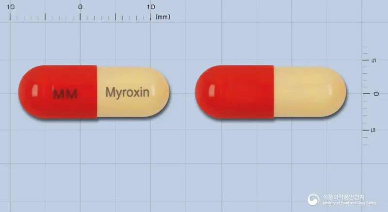 마이록신캡슐(은교산건조엑스8.16->1) 앞뒤 사진 (빨간색 캡슐, 각인 MM Myroxin)