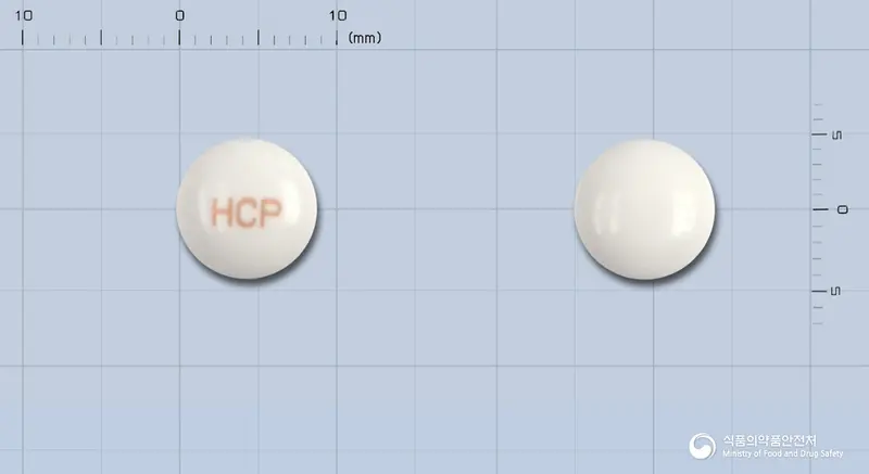 하이치올씨프리미어정 앞뒤 사진 (흰색 원형, 각인 HCP)