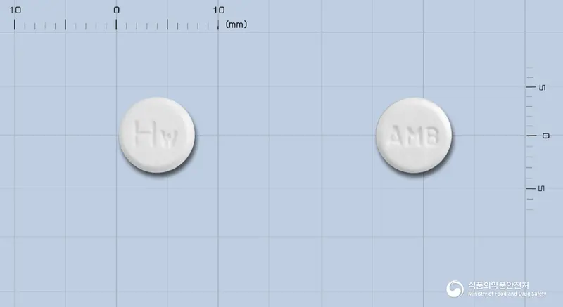로우디핀정(암로디핀베실산염) 앞뒤 사진 (흰색 원형, 각인 Hw / AMB)