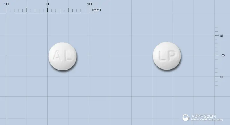 알리코프정(레보드로프로피진) 앞뒤 사진 (흰색 원형, 각인 AL / LP)