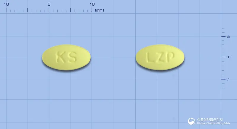루자탄플러스정 앞뒤 사진 (노란색 타원형, 각인 KS / LZP)