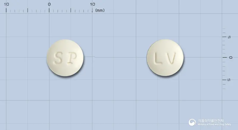 코푸투스정(레보드로프로피진) 앞뒤 사진 (흰색 원형, 각인 LV)