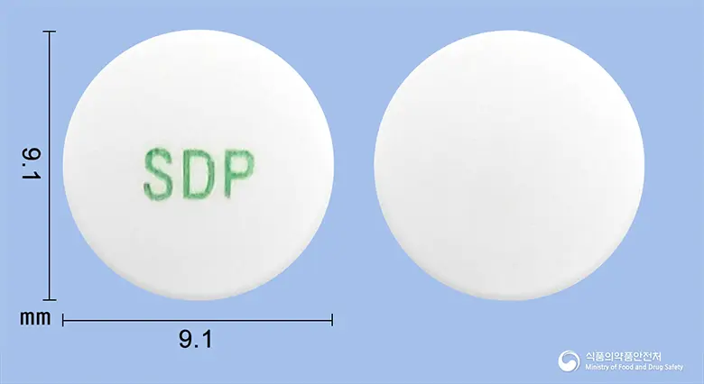 프라탐서방정0.2mg(탐스로신염산염) 앞뒤 사진 (흰색 원형, 각인 SDP)