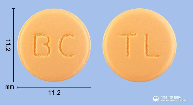 탈리나정(탈니플루메이트) 앞뒤 사진 (주황색 원형, 각인 BC / TL)
