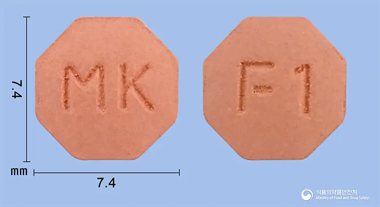 다모페시아정(피나스테리드) 앞뒤 사진 (분홍색 팔각형, 각인 MK / F1)