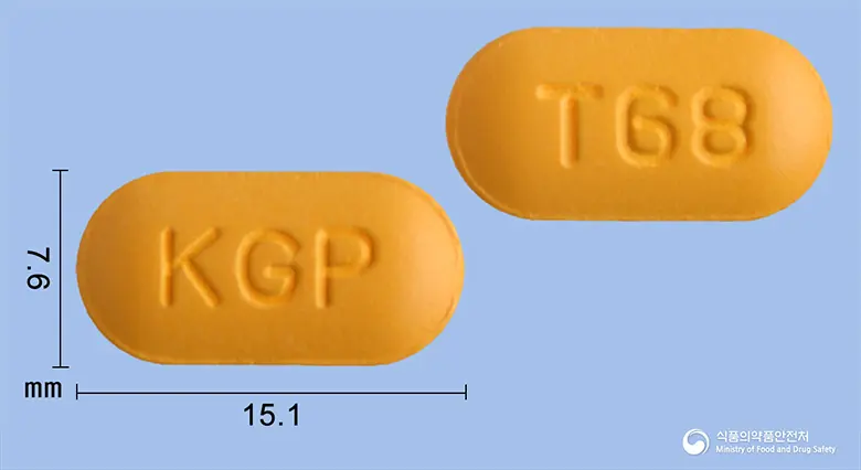 코에굿정 앞뒤 사진 (주황색 장방형, 각인 KGP / T68)