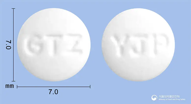 영진글리트존정(피오글리타존염산염) 앞뒤 사진 (흰색 원형, 각인 GTZ / YJP)
