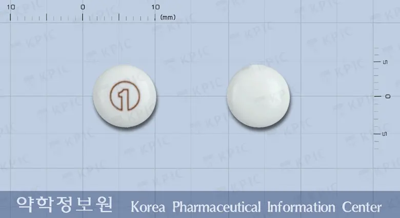 헤파자임정(디메크로틴산마그네슘) 앞뒤 사진 (흰색 원형)