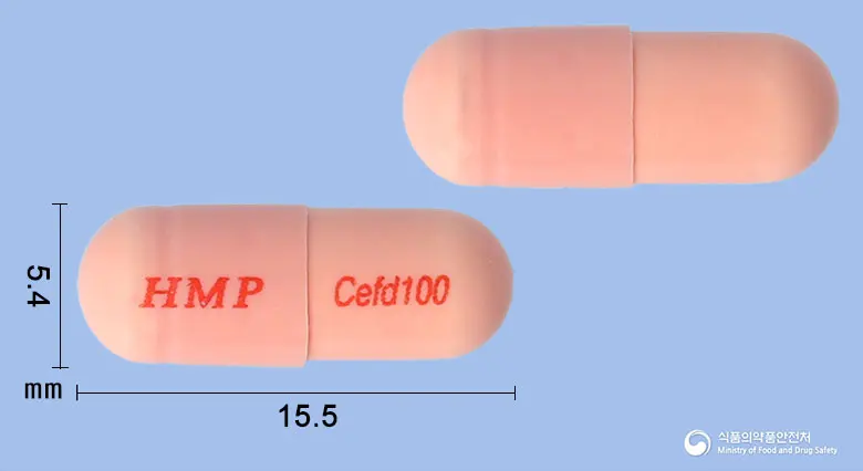 세프디어캡슐100밀리그램(세프디니르) 앞뒤 사진 (분홍색 캡슐, 각인 HMP Cefd100)