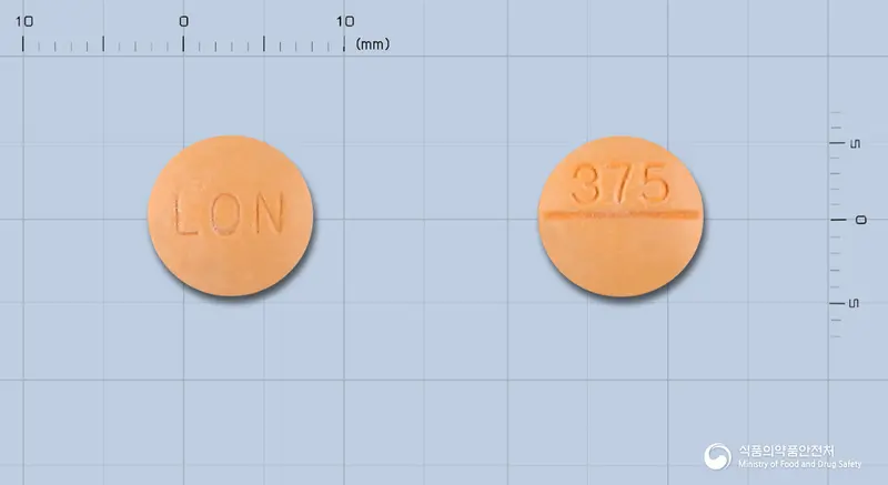 안국탈니플루메이트370mg정 앞뒤 사진 (주황색 원형, 각인 LON / 375)