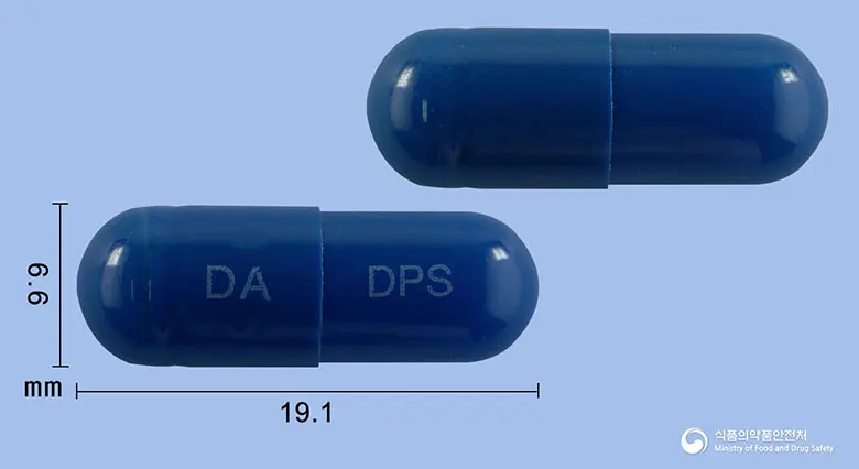 덴파사캡슐 앞뒤 사진 (파란색 캡슐, 각인 DA DPS)