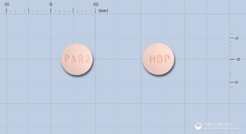 파로킨정2mg(로피니롤염산염) 앞뒤 사진 (분홍색 원형, 각인 PAR2 / HDP)