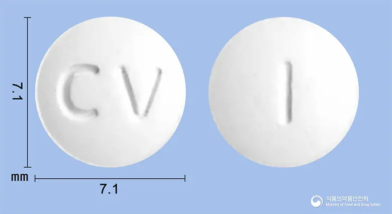 도페질정5mg(도네페질염산염수화물) 앞뒤 사진 (흰색 원형, 각인 CV / I)