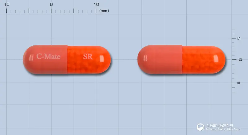 씨메이트에스알캡슐(아스코르브산) 앞뒤 사진 (분홍색 캡슐, 각인 C-Mate SR)