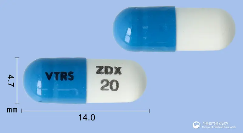 젤독스캡슐20밀리그램(지프라시돈염산염일수화물) 앞뒤 사진 (파란색 캡슐, 각인 VTRS ZDX 20)