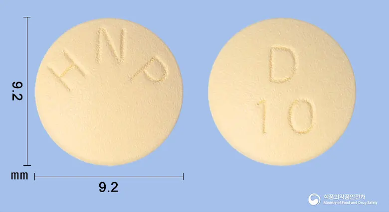 도네트정10밀리그램(도네페질염산염) 앞뒤 사진 (주황색 원형, 각인 HNP / D10)