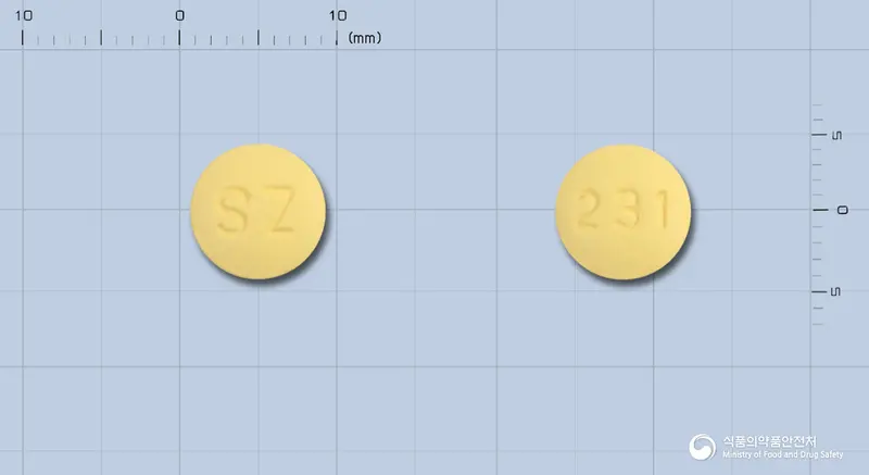 케티맥스정100밀리그램(푸마르산쿠에티아핀) 앞뒤 사진 (노란색 원형, 각인 SZ / 231)