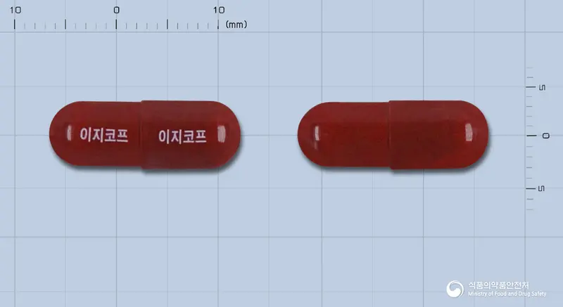 이지코프플러스캡슐 앞뒤 사진 (빨간색 캡슐, 각인 이지코프 이지코프)