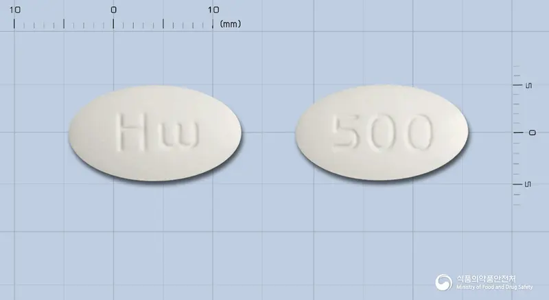아목시탐정500mg(아목시실린·설박탐피복실) 앞뒤 사진 (흰색 타원형, 각인 500)