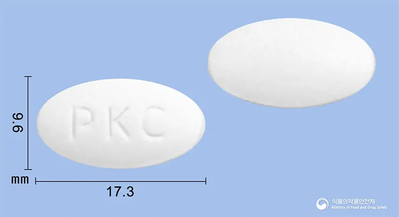 뉴피론정500mg(아목시실린·설박탐피복실) 앞뒤 사진 (흰색 타원형, 각인 PKC)