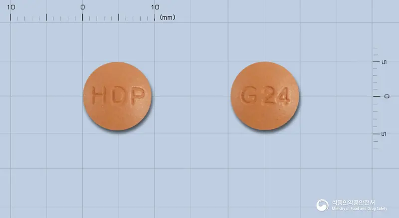 타미린서방정24밀리그램(갈란타민브롬화수소산염) 앞뒤 사진 (주황색 원형, 각인 HDP / G24)