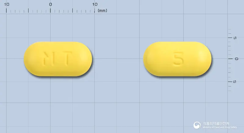 메티벤정500/5mg(수출용) 앞뒤 사진 (노란색 장방형, 각인 MT / 5)