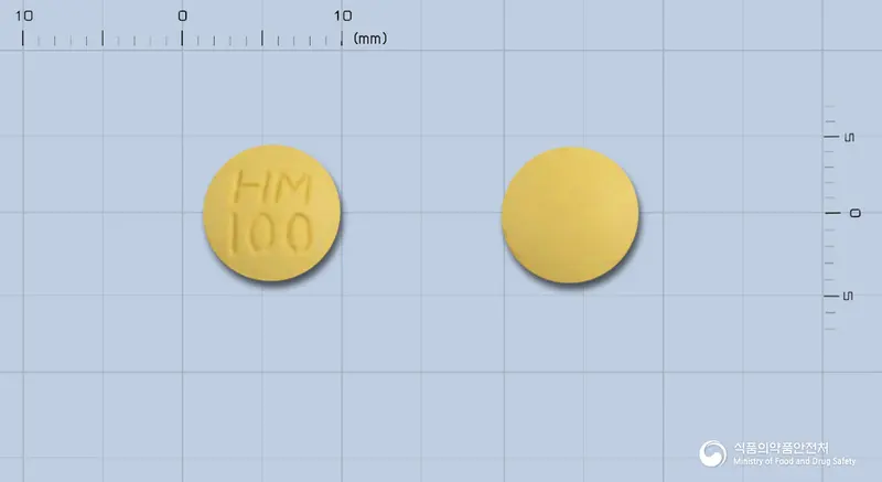 스무디핀정100밀리그램(쿠에티아핀푸마르산염) 앞뒤 사진 (노란색 원형, 각인 HM100)