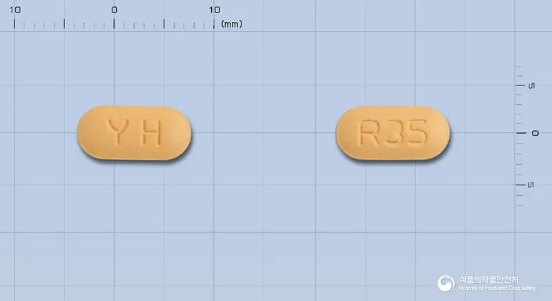 리스넬정35mg(리세드론산나트륨일수화물) 앞뒤 사진 (주황색 장방형, 각인 YH / R35)