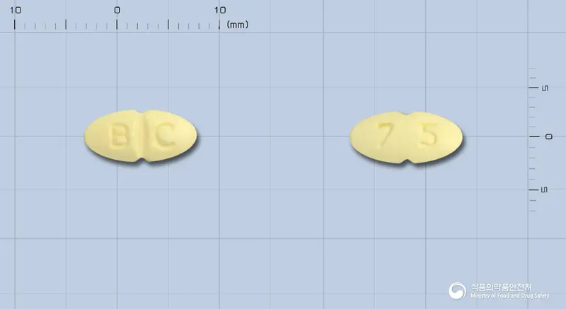 엑시플러스정7.5/12.5mg 앞뒤 사진 (노란색 타원형, 각인 B C / 75)
