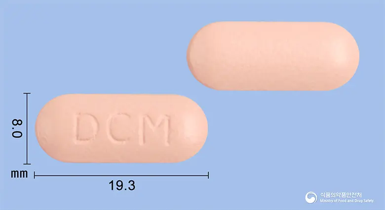 동구레보플록사신수화물정500mg 앞뒤 사진 (분홍색 장방형, 각인 DCM)