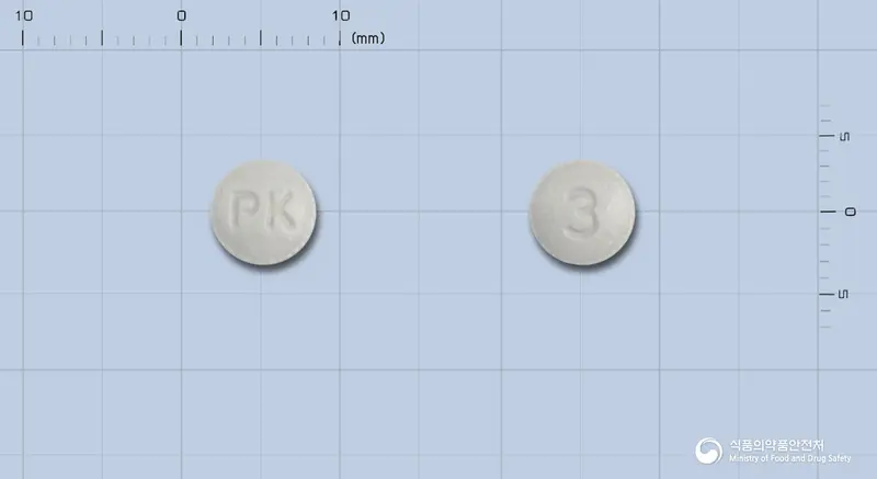 파비나제정(프로나제B) 앞뒤 사진 (회색 원형, 각인 PK / 3)
