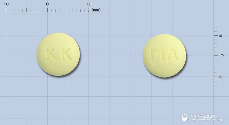 마르민정(방풍통성산건조엑스) 앞뒤 사진 (연두색 원형, 각인 KK / MΛ)