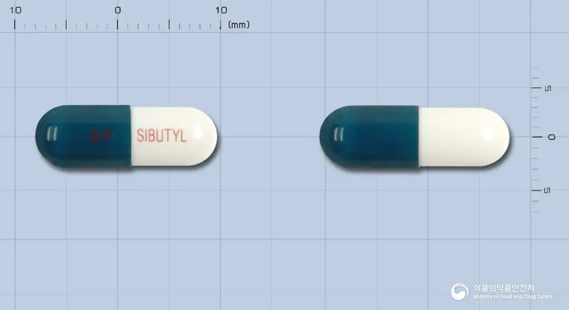 시부틸캡슐12.55mg(시부트라민) 앞뒤 사진 (파란색 캡슐, 각인 SP SIBUTYL)