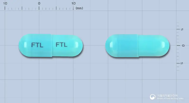 동방메페남산캡슐 앞뒤 사진 (파란색 캡슐, 각인 FTL FTL)