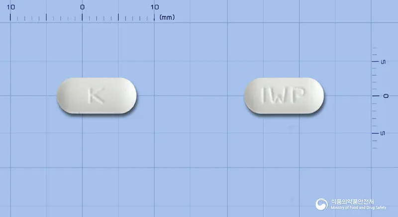 기스톱정(세티리진염산염) 앞뒤 사진 (흰색 장방형, 각인 K / IWP)