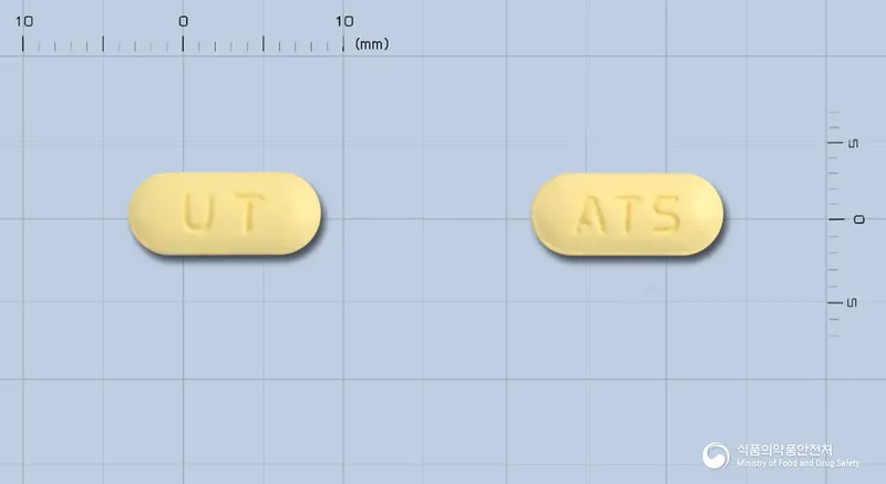 슈퍼셋세미정 앞뒤 사진 (노란색 장방형, 각인 UT / ATS)
