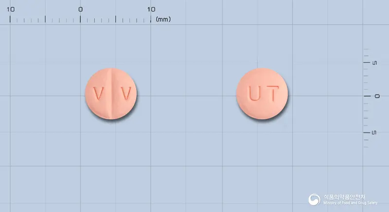 디잔틴정80밀리그램(발사르탄) 앞뒤 사진 (분홍색 원형, 각인 V V / UT)