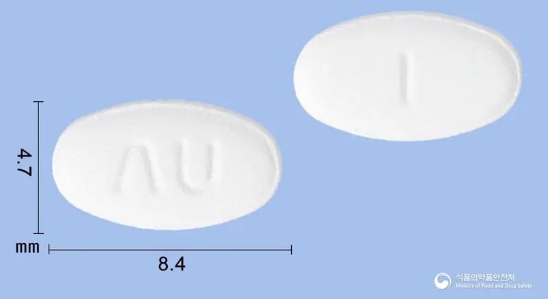 알씨텍정5mg(레보세티리진염산염) 앞뒤 사진 (흰색 타원형, 각인 ΛU / 1)