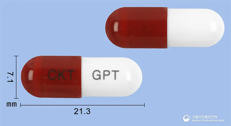 세바신캡슐(은교산) 앞뒤 사진 (빨간색 캡슐, 각인 CKT GPT)