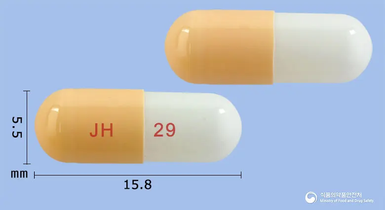 탐스루신캡슐(탐스로신염산염) 앞뒤 사진 (주황색 캡슐, 각인 JH 29)