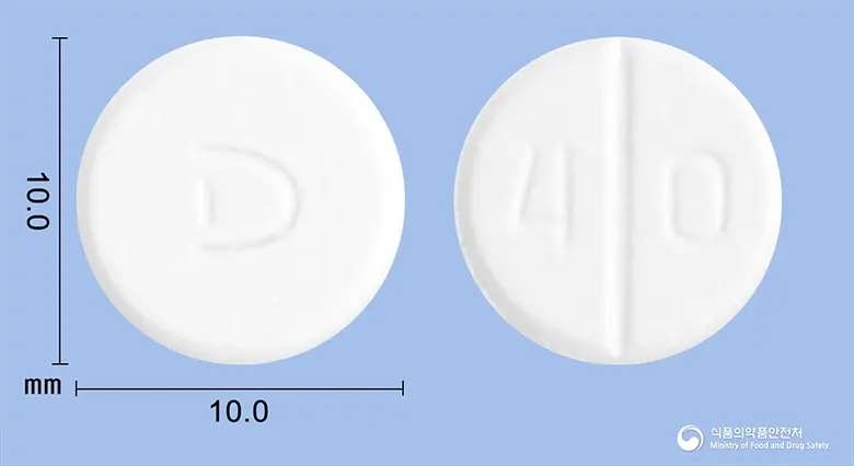 메게시아정40mg(메게스트롤아세테이트) 앞뒤 사진 (흰색 원형, 각인 4 0)