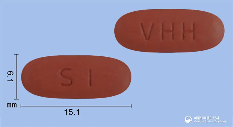 네오반플러스에프정 앞뒤 사진 (빨간색 타원형, 각인 SI / VHH)
