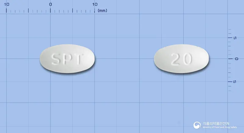 스피틴정20밀리그램(아토르바스타틴칼슘삼수화물) 앞뒤 사진 (흰색 타원형, 각인 SPT / 20)