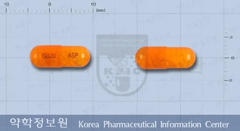 아스피어캡슐(아스피린장용피입자) 앞뒤 사진 (주황색·투명 캡슐, 각인 GUJU ASP)