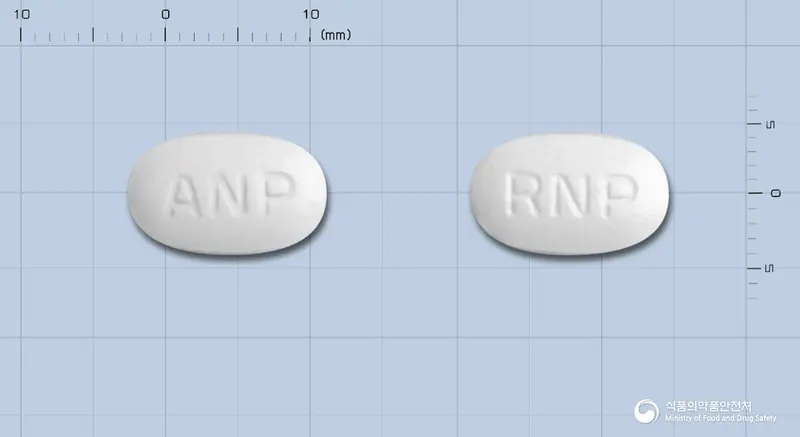 리노펜정(수출용) 앞뒤 사진 (흰색 장방형, 각인 ANP / RNP)